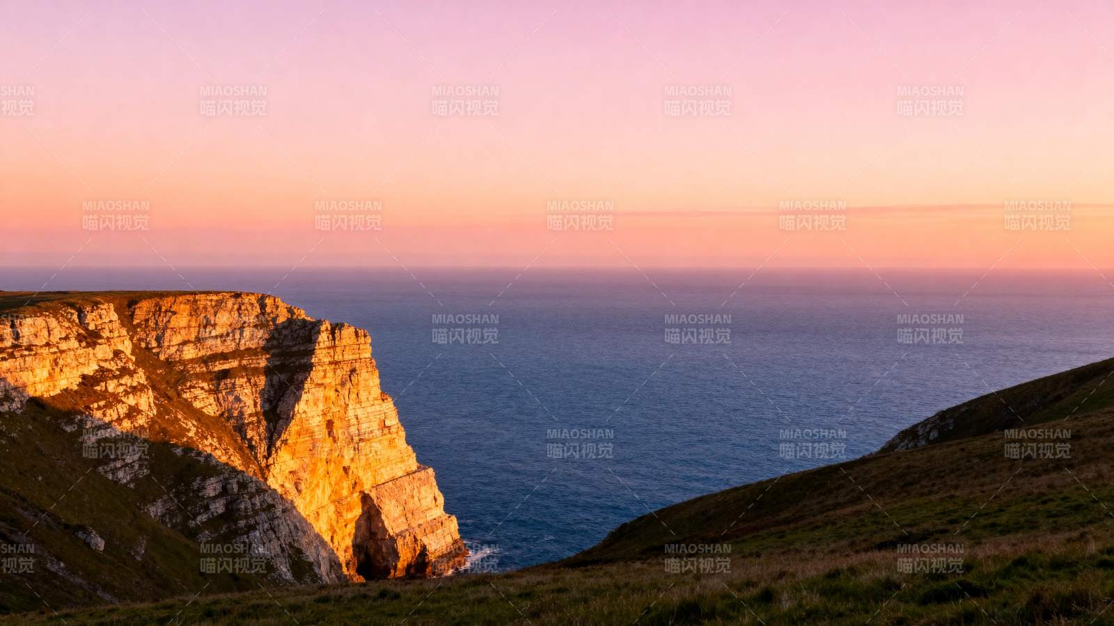 悬崖日落海景图片