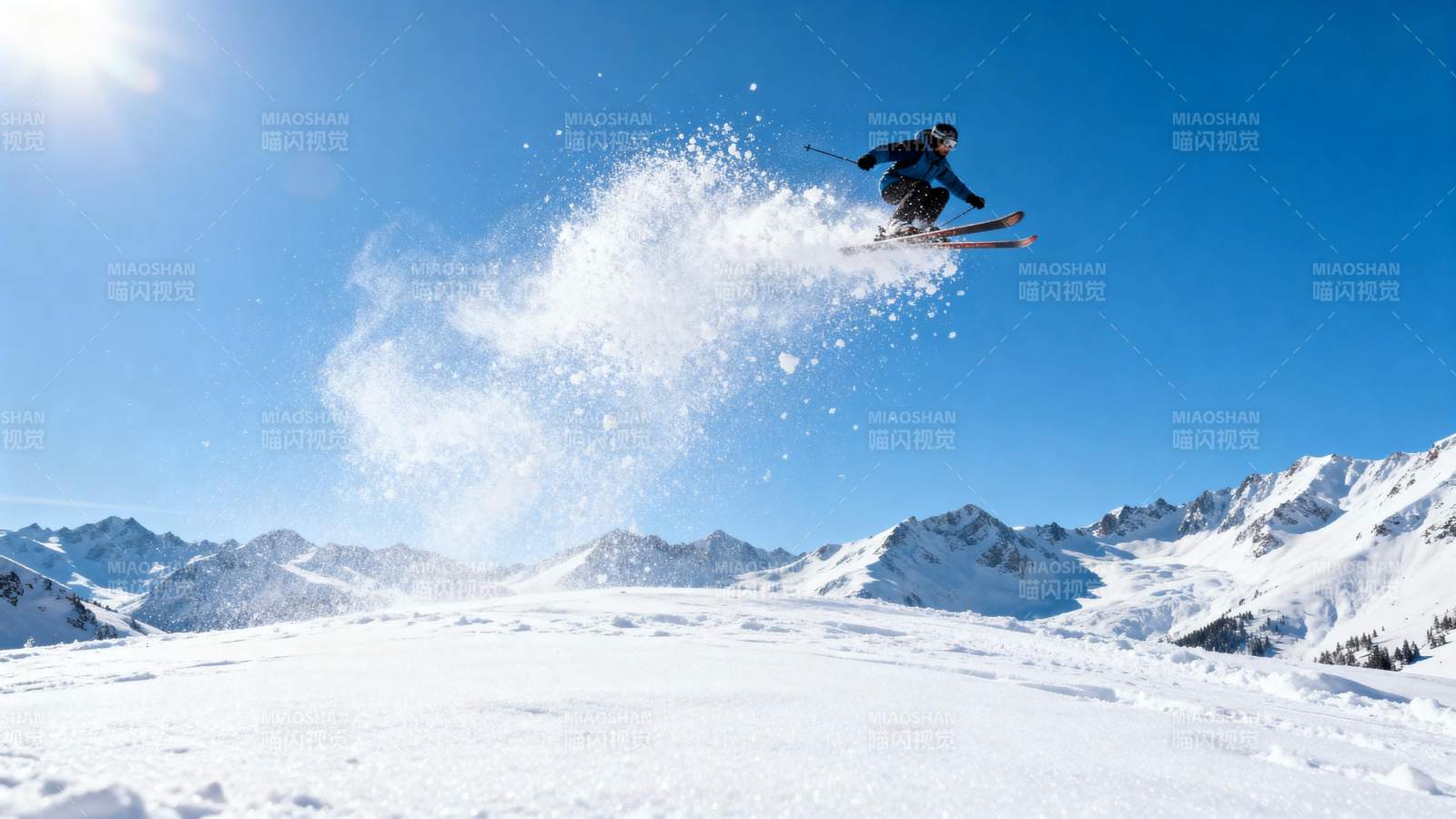 滑雪飞跃雪峰图片