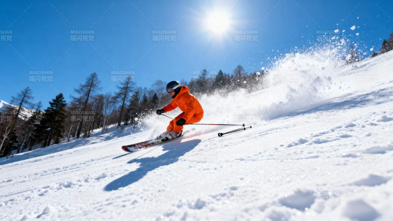 滑雪者在雪坡疾驰图片