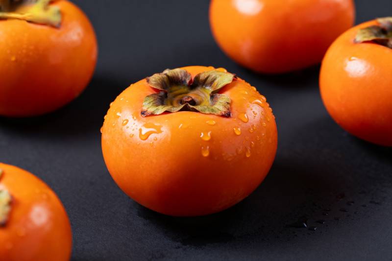 晶莹柿子特写图片