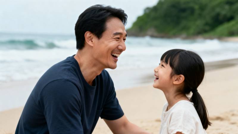 父女海滩笑语图片