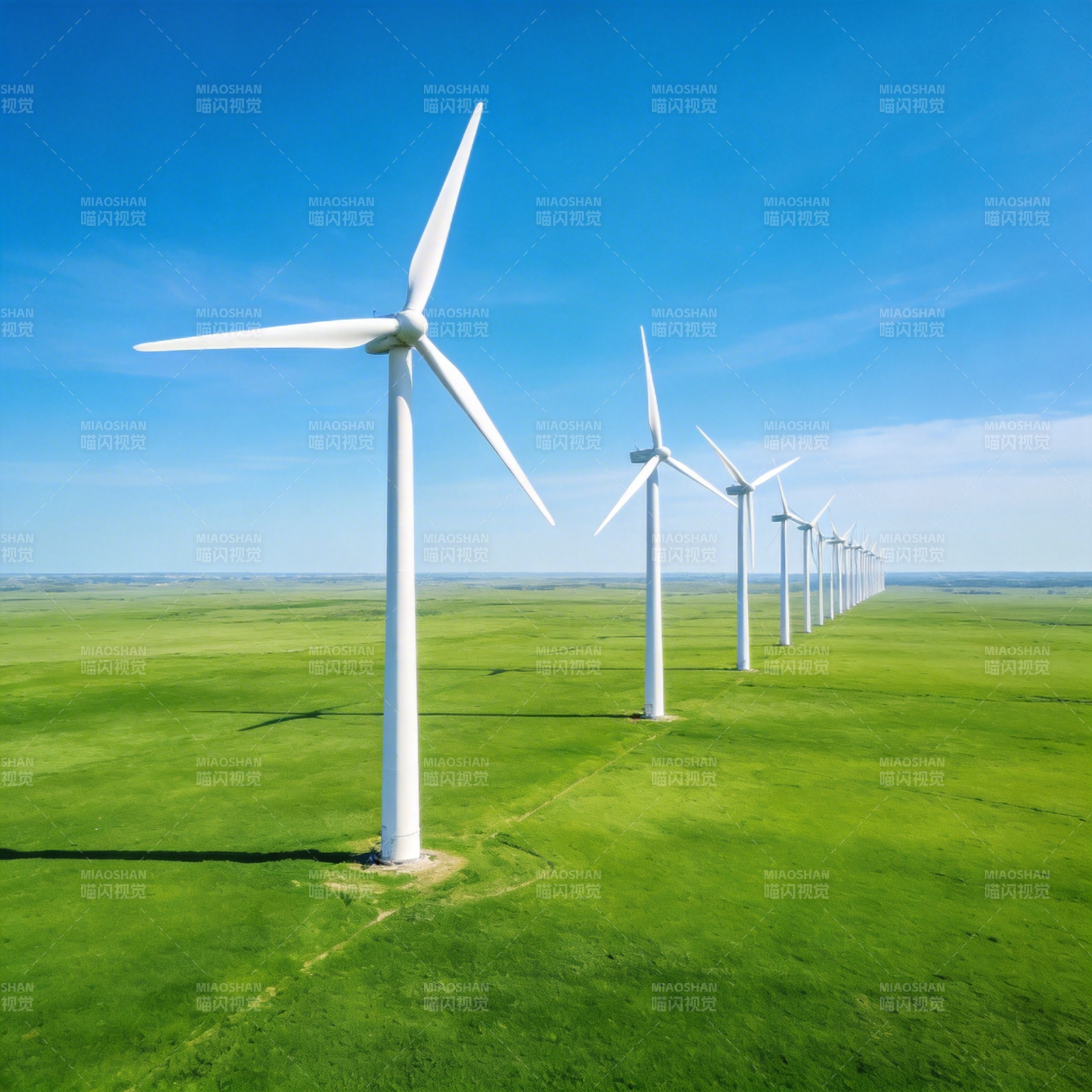 风车列阵绿野蓝天图片