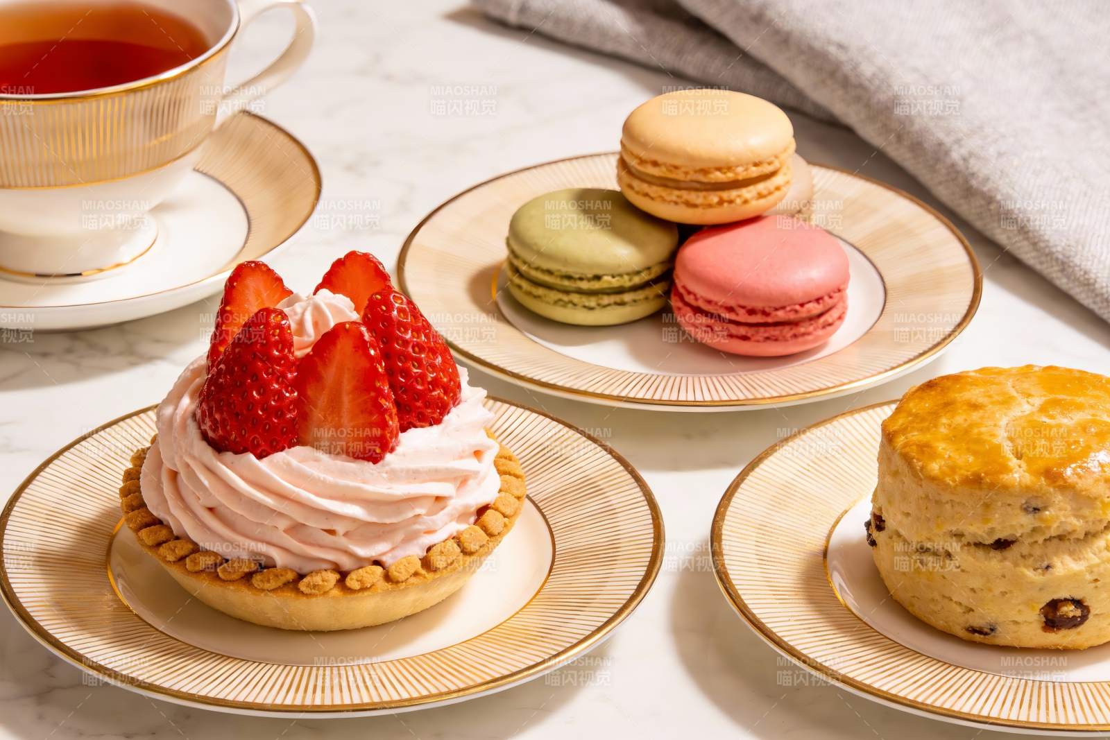 精致下午茶甜点与茶杯图片