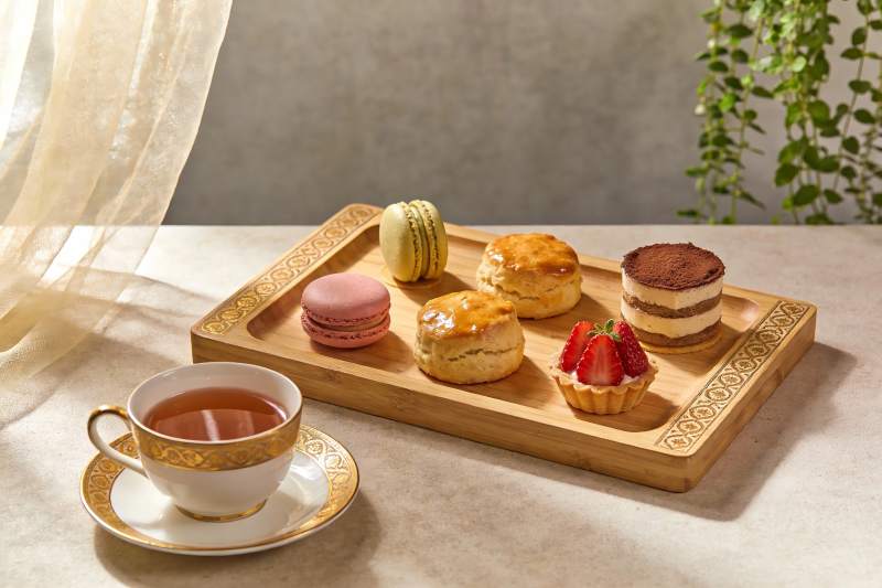 精致下午茶点心与茶杯图片