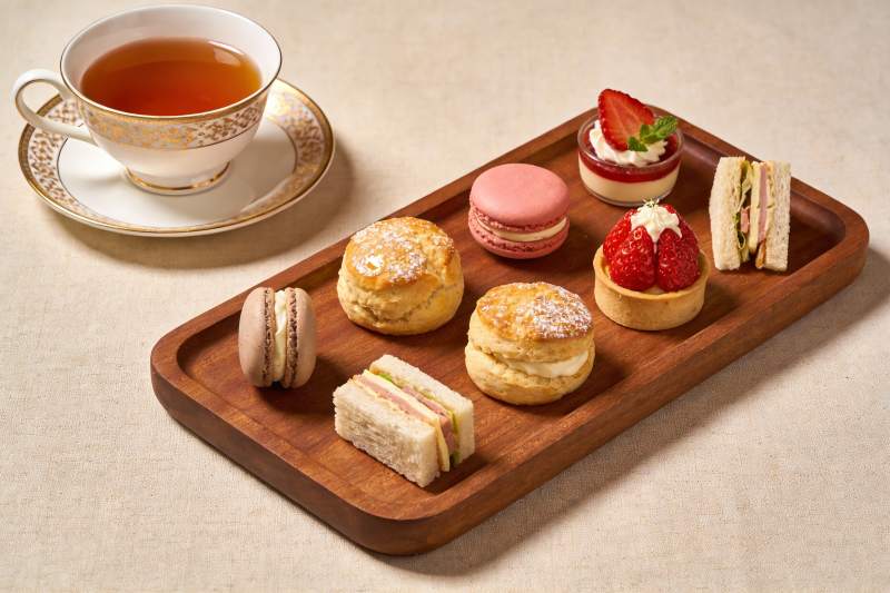 精致下午茶点心与茶杯图片