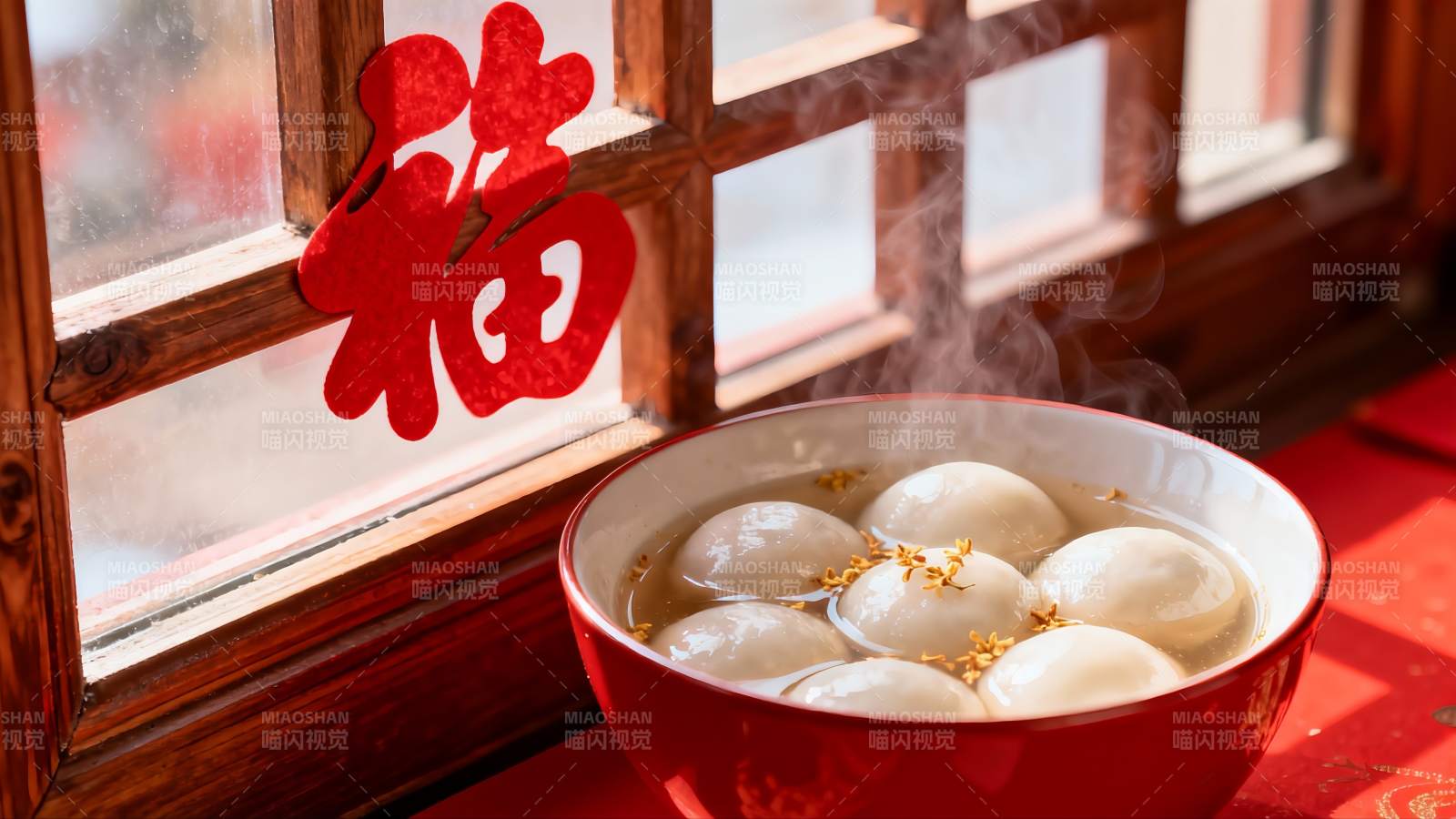 窗边热气腾腾的汤圆图片