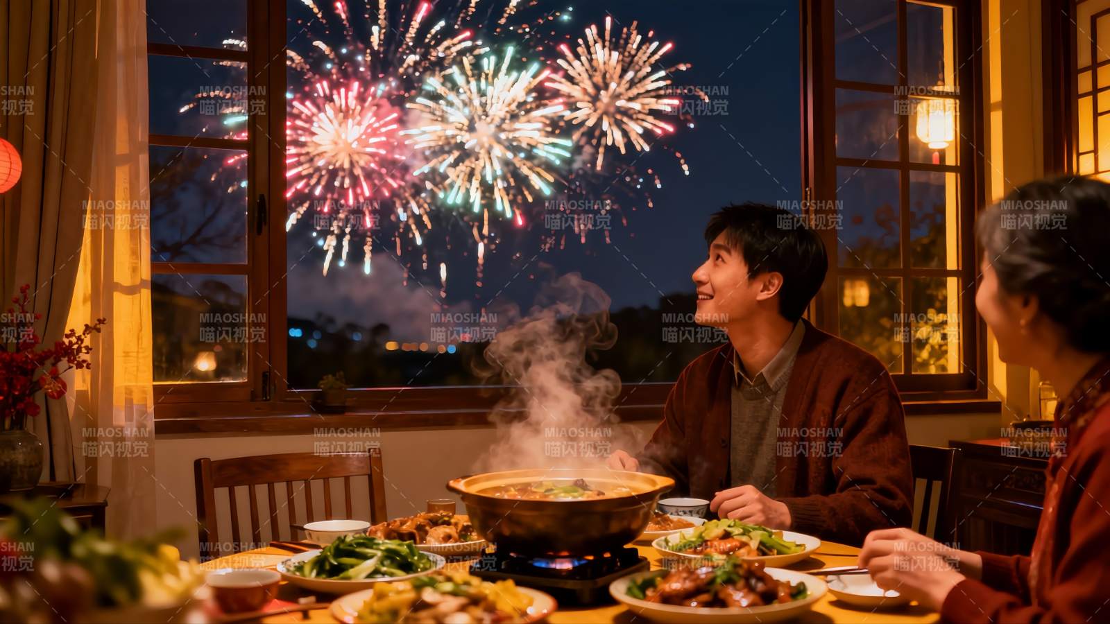年夜饭窗外烟花绽放图片