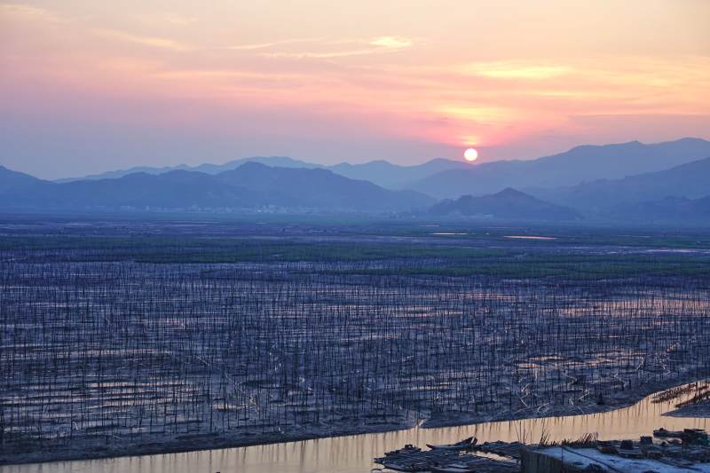 日落渔场美景图片