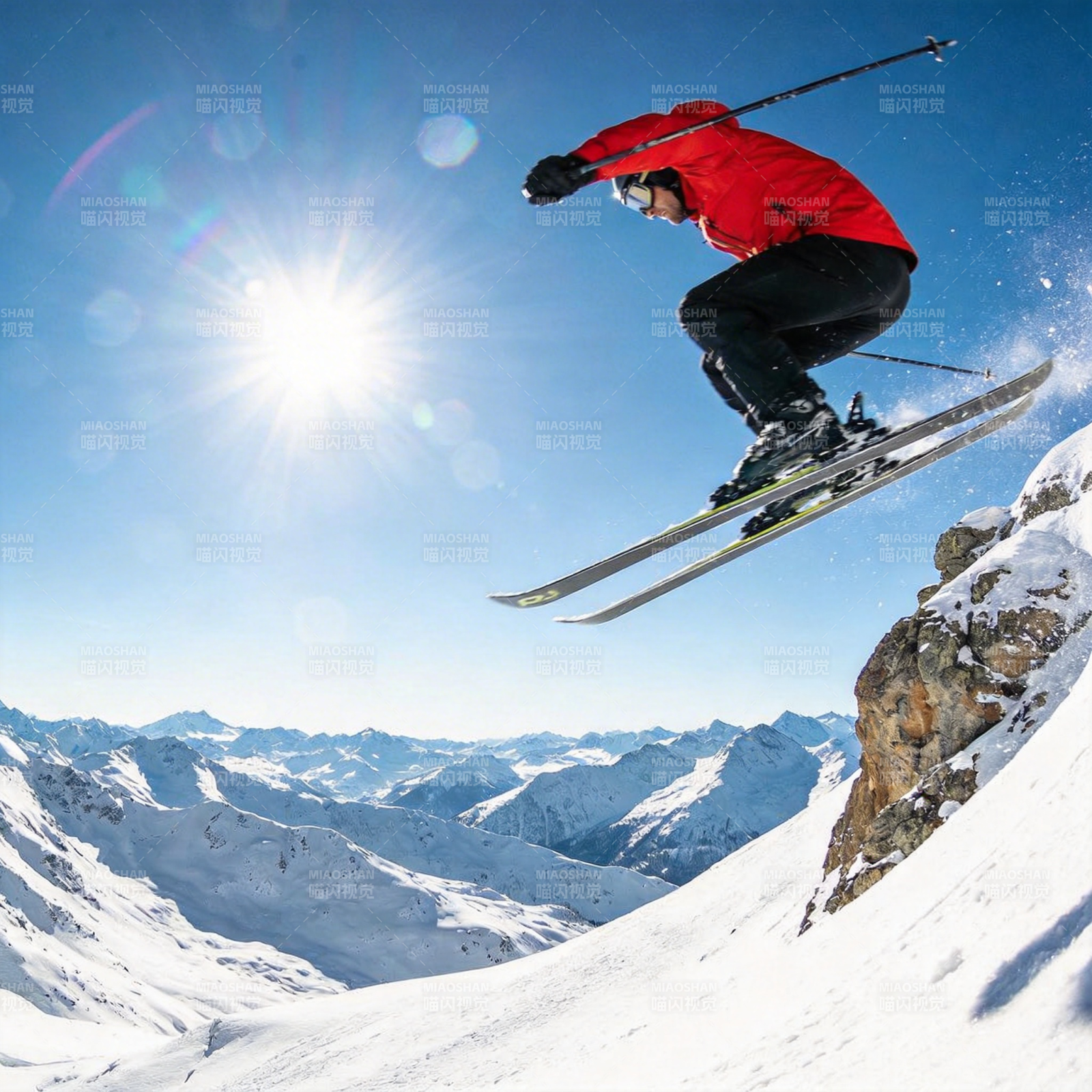 滑雪飞跃雪峰图片